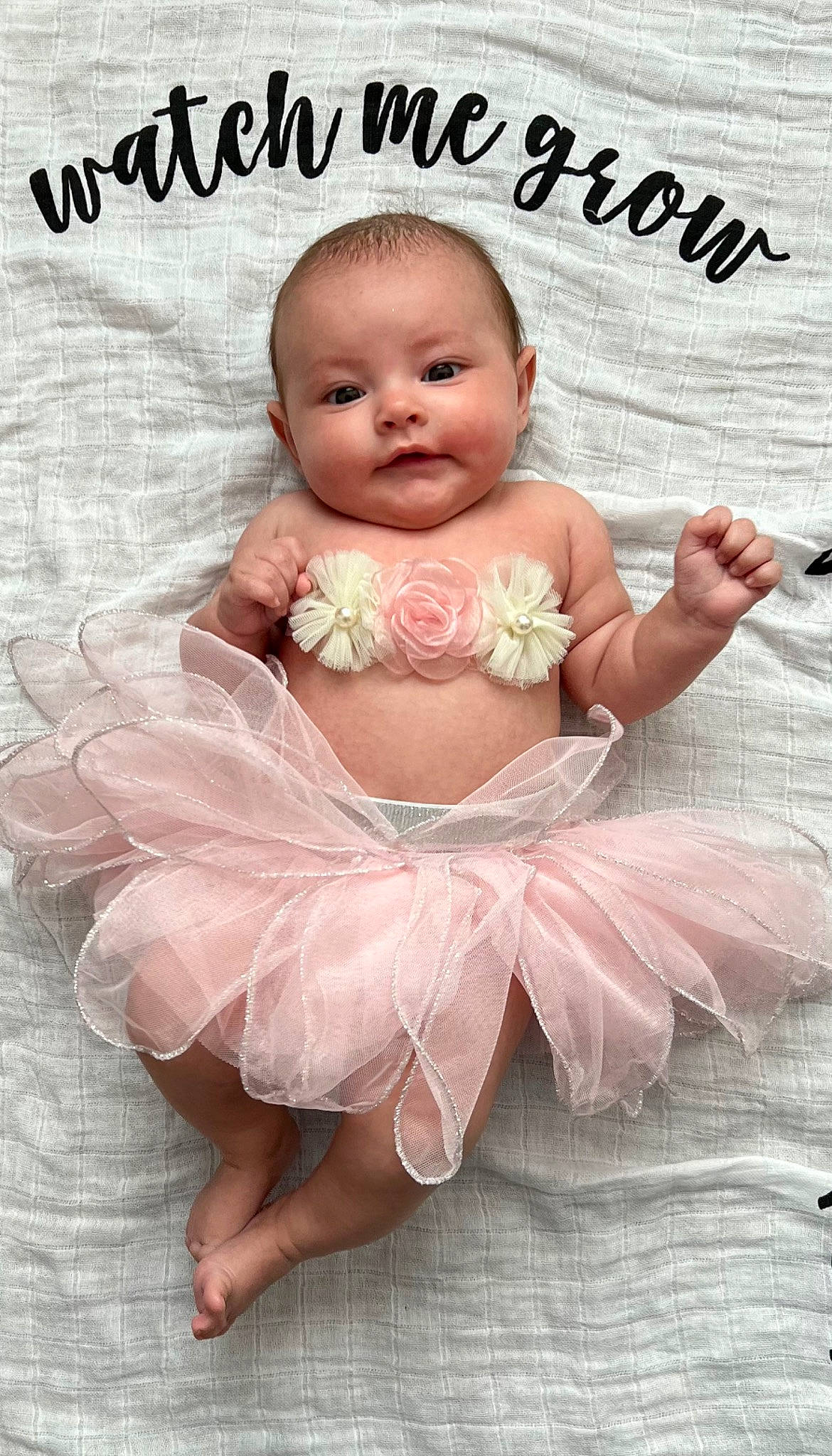 Evelynn joined the competition — help win amazing prizes! abdomen, baby, baby_products, baby_toddler_clothing, beauty, chest, fashion_accessory, finger, gesture, happy, headgear, jewellery, pattern, peach, person, pink, skin, smile, textile, thumb