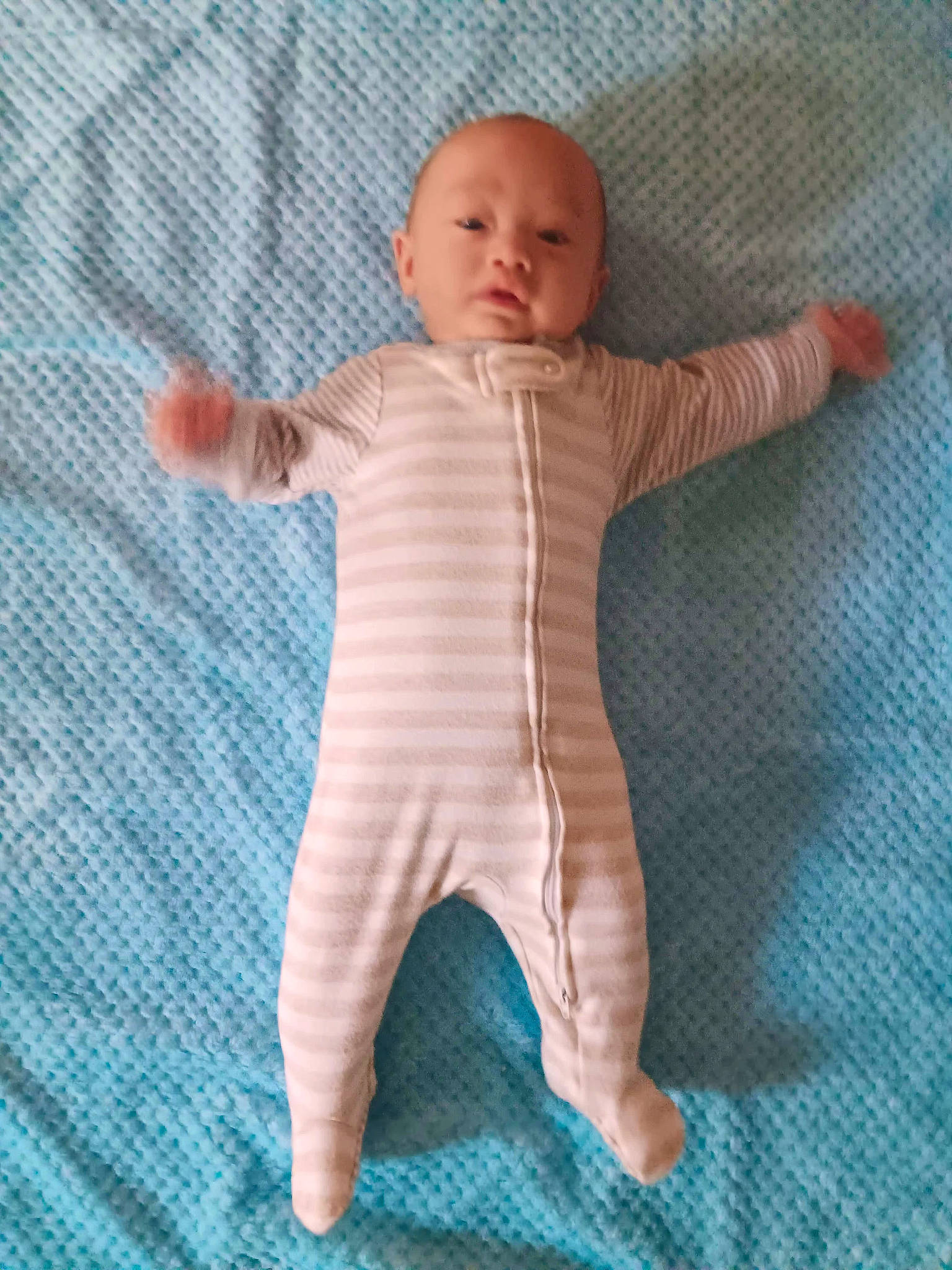 Avery is registered to the contest to win money with this photo: art, baby, baby_toddler_clothing, baby_toys, child, comfort, creative_arts, electric_blue, finger, hand, head, knitting, linens, pattern, person, sleeve, textile, thumb, toddler, vertebrate