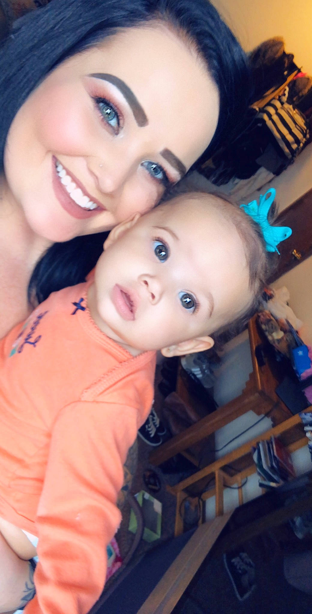 Kylynn is registered to the contest to win money with this photo: black_hair, brown_hair, cheek, child, eye, eyebrow, face, forehead, fun, girl, happiness, head, human_hair_color, iris, joy, nose, person, product, skin, smile