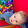 baby, balloon, bodypart, crawling, face, finger, food, hand, happy, head, indoorplayarea, indoors, outdoorplayarea, person, photography, playarea, portrait, smile, sphere, sweets