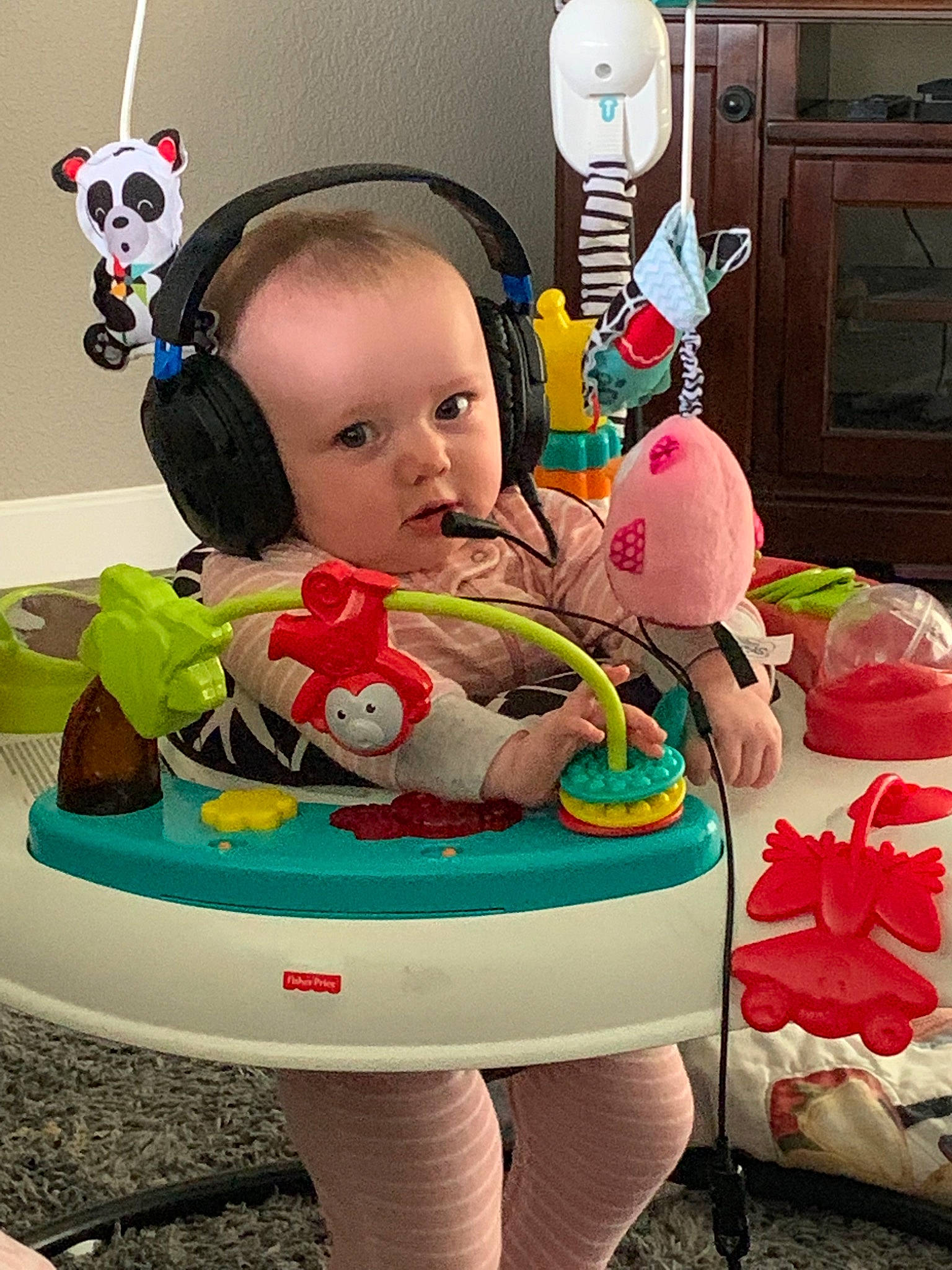 Ensley is registered to the contest to win money with this photo: baby, baby_toys, birthday, cake, child, eating, food, party, person, pink, play, sitting, skin, toddler, toy