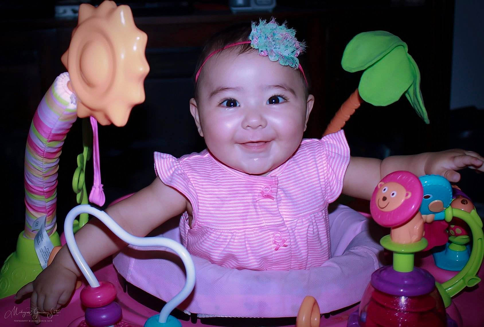 Alena joined the competition — help win amazing prizes! baby, baby_toys, child, finger, fun, hair_accessory, joy, party, person, pink, play, product, skin, smile, toddler, toy