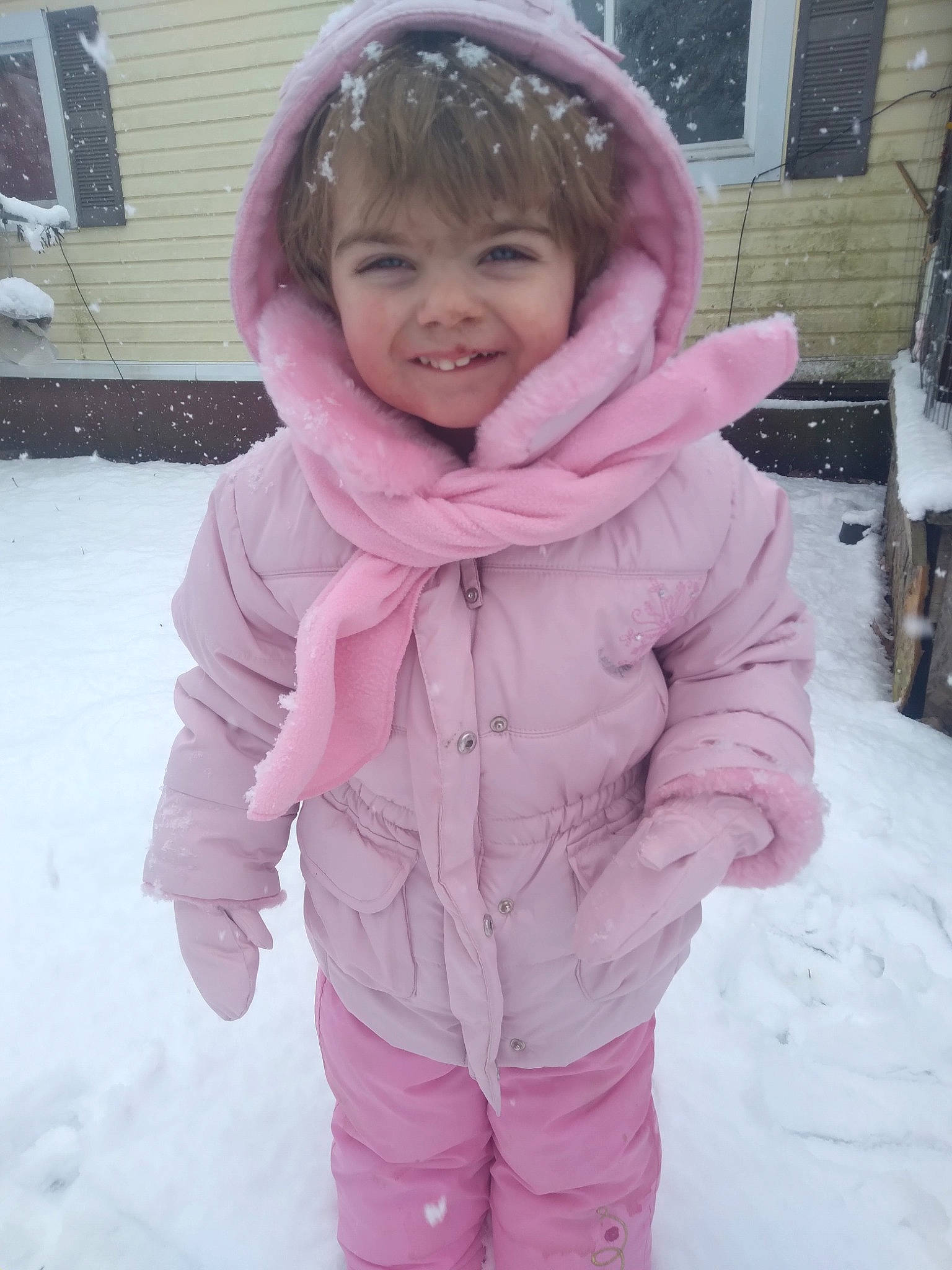 Candis Wheeler joined the competition — help win amazing prizes! baby_toddler_clothing, cheek, child, clothing, freezing, fur, happy, jacket, joy, magenta, parka, person, pink, precipitation, purple, sleeve, smile, snow, textile, toddler