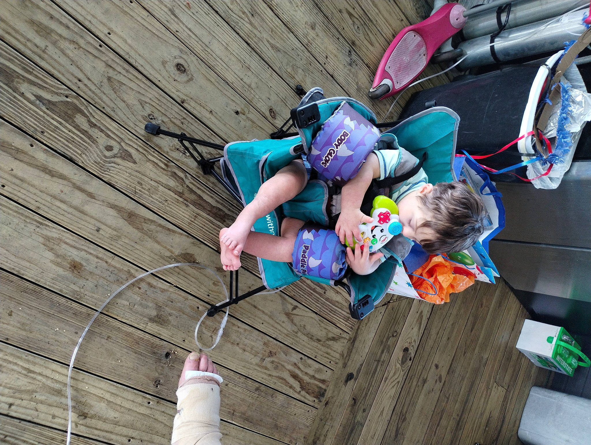 William joined the competition — help win amazing prizes! adventure, bag, child, electric_blue, fun, leisure, luggage_and_bags, magenta, motor_vehicle, person, pink, purple, recreation, rope, sandal, sitting, tire, toddler, tree, wheel