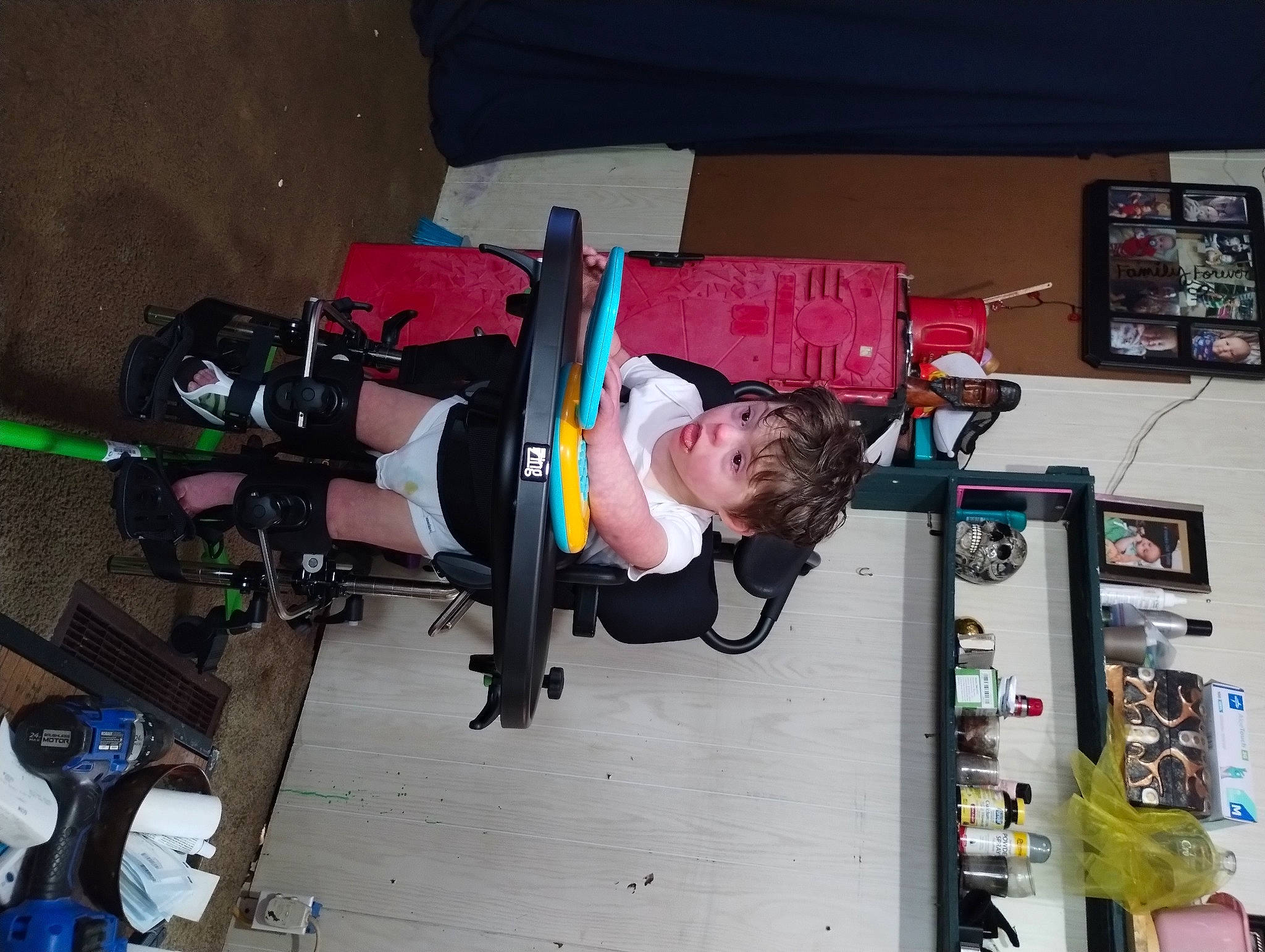 William is registered to the contest to win money with this photo: baby_products, carmine, machine, person, recreation, surprise, tire, toddler