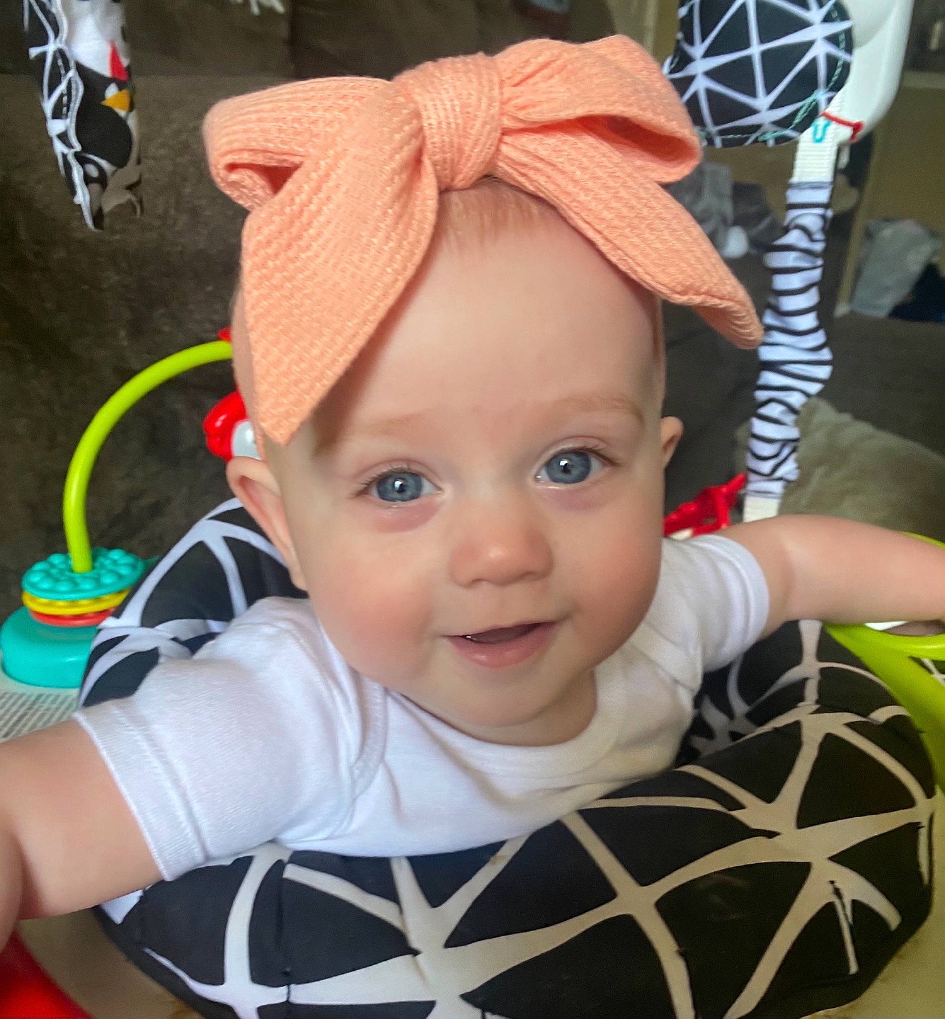 Kora is registered to the contest to win money with this photo: audio_equipment, baby, baby_toddler_clothing, cap, cheek, child, cool, costume_hat, ear, eye, eyebrow, eyelash, fun, happy, headwear, iris, person, skin, smile, toddler