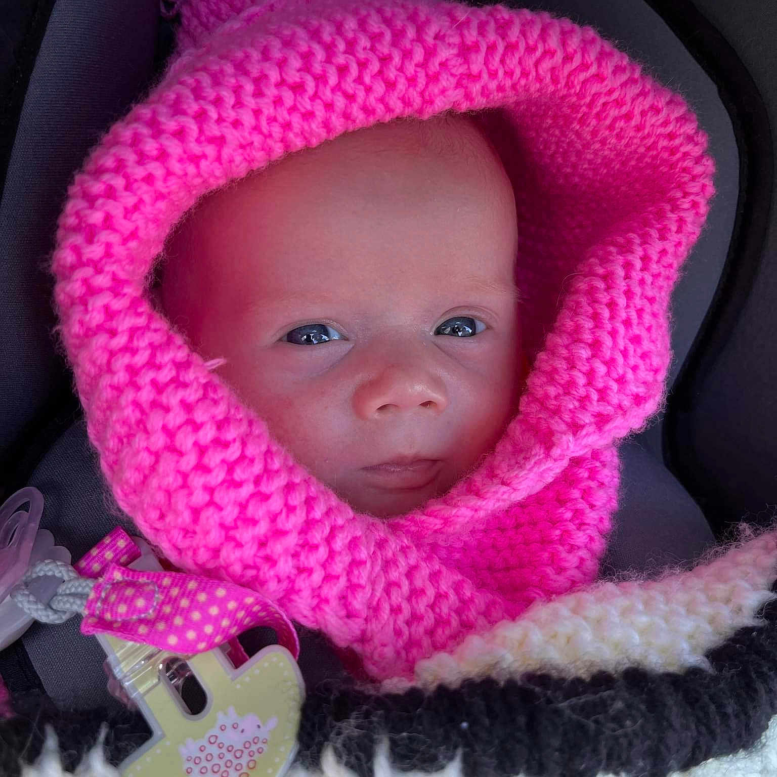Aria participe au concours pour gagner de l'argent avec cette photo : baby, baby_toddler_clothing, cap, cheek, clothing, cool, eye, eyebrow, head, headgear, iris, lip, magenta, mouth, organ, outerwear, pink, skin, sleeve, toddler