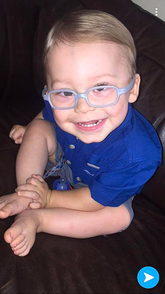 Brayton joined the competition — help win amazing prizes! arm, cheek, child, ear, eye, face, facial_expression, finger, fun, glasses, hand, head, iris, joy, nose, person, skin, smile, toddler, tooth