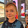 Noah participe au concours pour gagner de l'argent avec cette photo : child, boy, earring, smile, portrait, shopping_mall, indoor, tshirt, short_hair, face, person, casual_clothing, background, girl, colorful_dress, people, store, advertisement, light, happy
