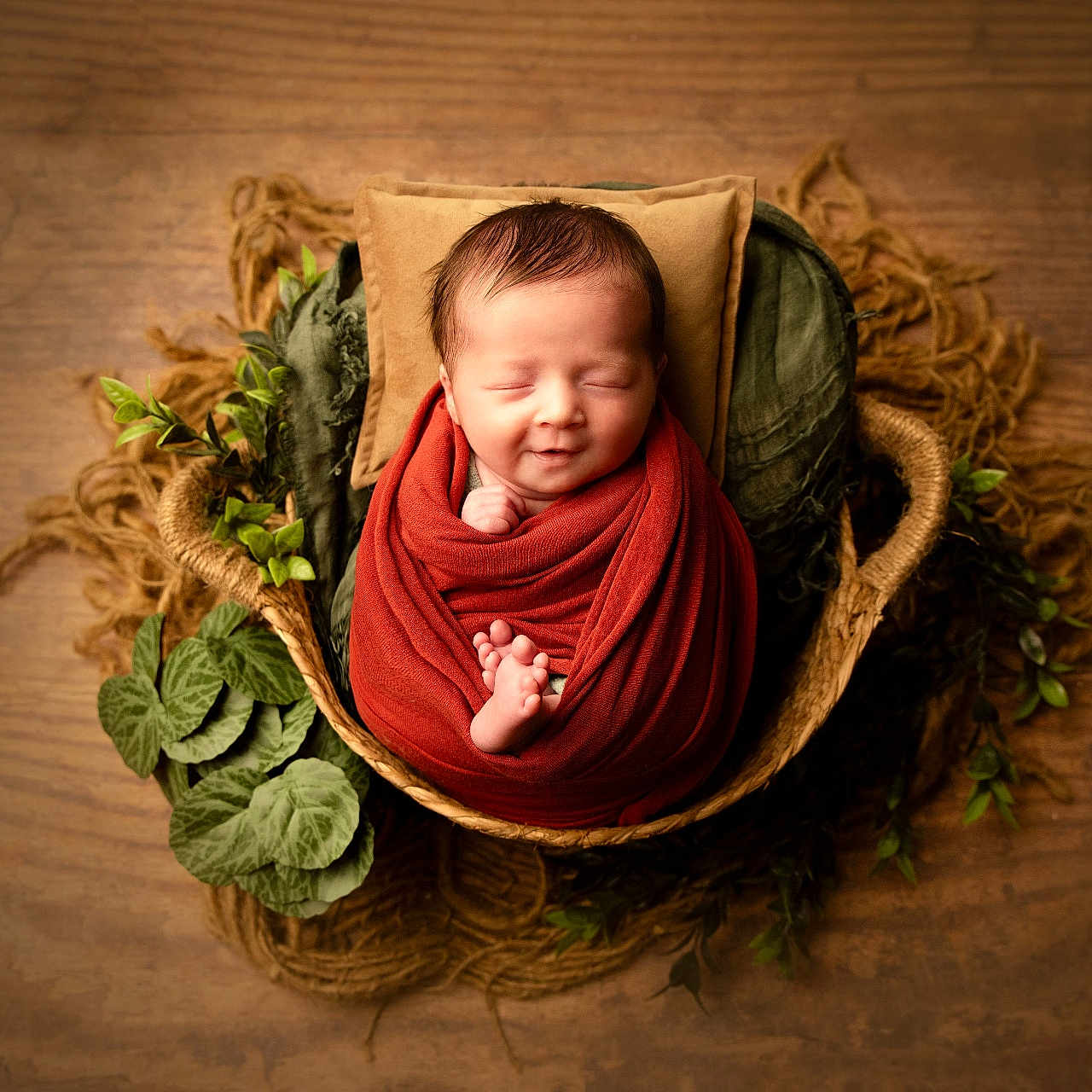 Isaac participe au concours pour gagner de l'argent avec cette photo : baby, basket, clothing, face, flower, flowerarrangement, flowerbouquet, happy, hardwood, hat, head, hood, leaf, newborn, person, photography, plant, portrait, smile, wood