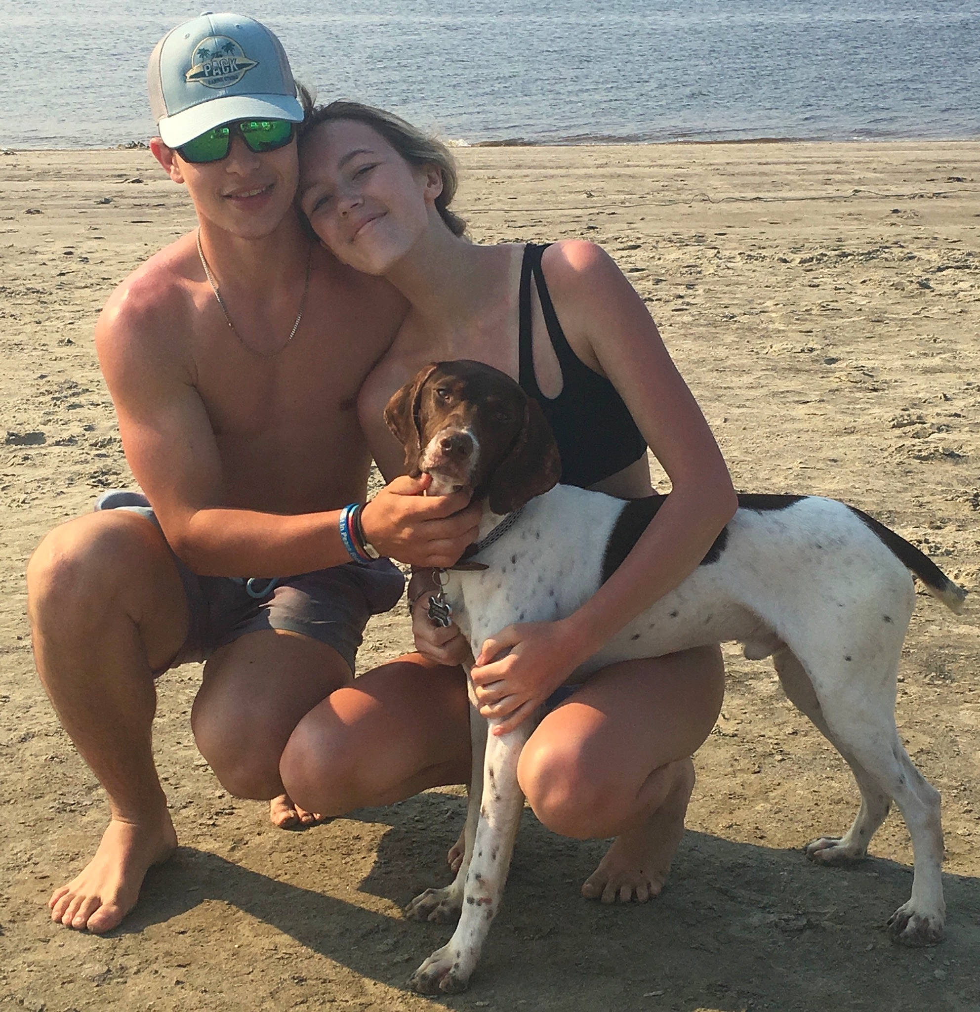 Kahlúa joined the competition — help win amazing prizes! barefoot, beach, carnivore, dog, eyewear, fawn, goggles, happy, hat, knee, leg, leisure, people_in_nature, people_on_beach, photograph, shorts, smile, sunglasses, swimwear, thigh