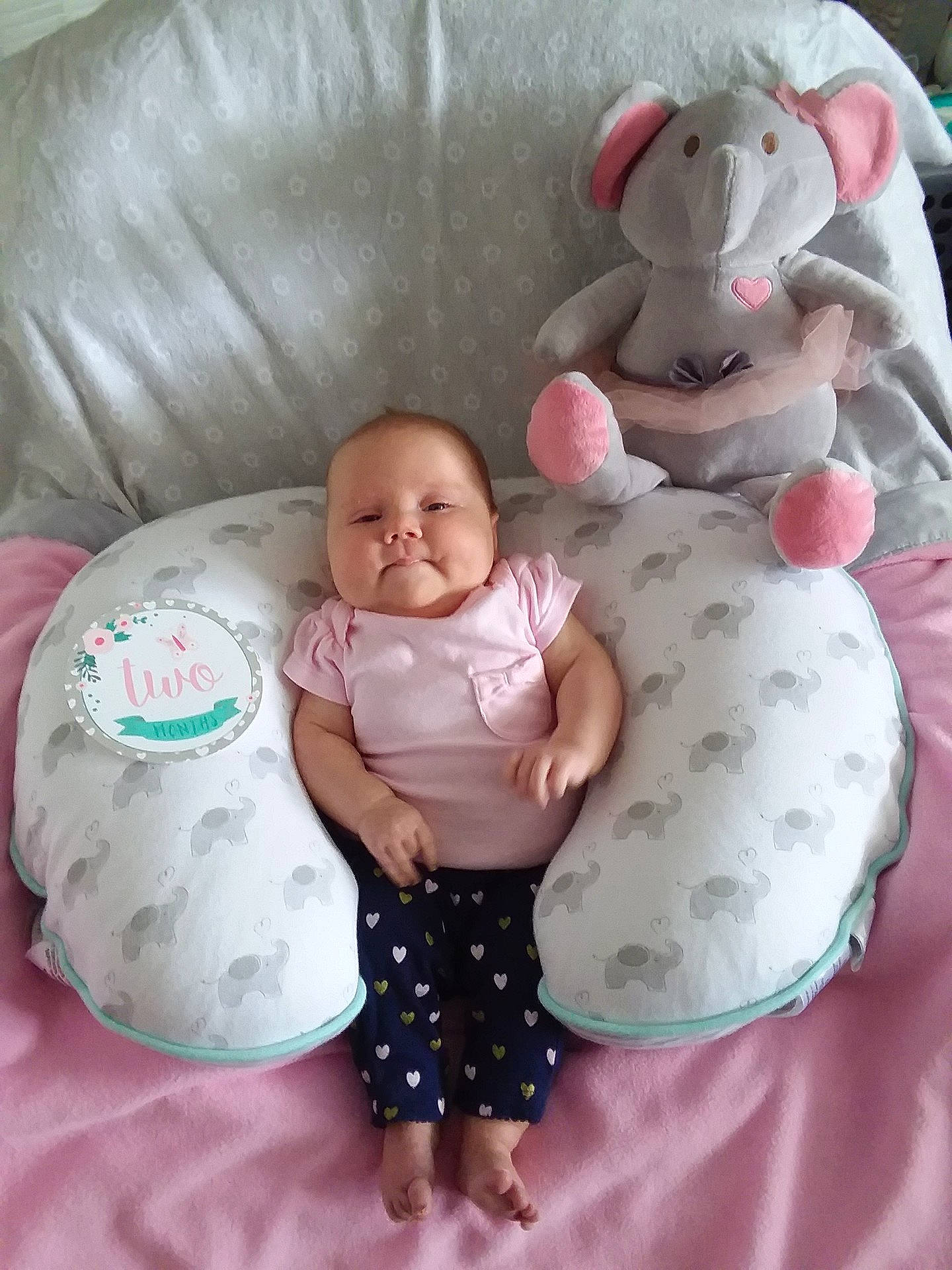 Danielle is registered to the contest to win money with this photo: baby_products, baby_toys, bed, bedtime, child, infant, infant_bed, joy, material, nap, person, pink, play, product, stuffed_toy, textile, toddler, toy
