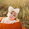 Eleanor is registered to the contest to win money with this photo: baby, child, infant, portrait, pumpkin, autumn, outdoor, grass, nature, bow, headband, orange, sitting, smiling, face, eyes, hand, baby_photography, cute, seasonal