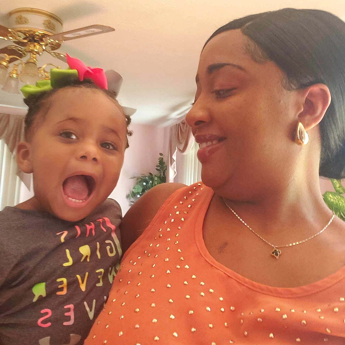 Phoenix is registered to the contest to win money with this photo: accessories, adult, appliance, baby, ceilingfan, clothing, device, earring, electricaldevice, face, female, glasses, head, jewelry, necklace, person, photography, portrait, t_shirt, woman