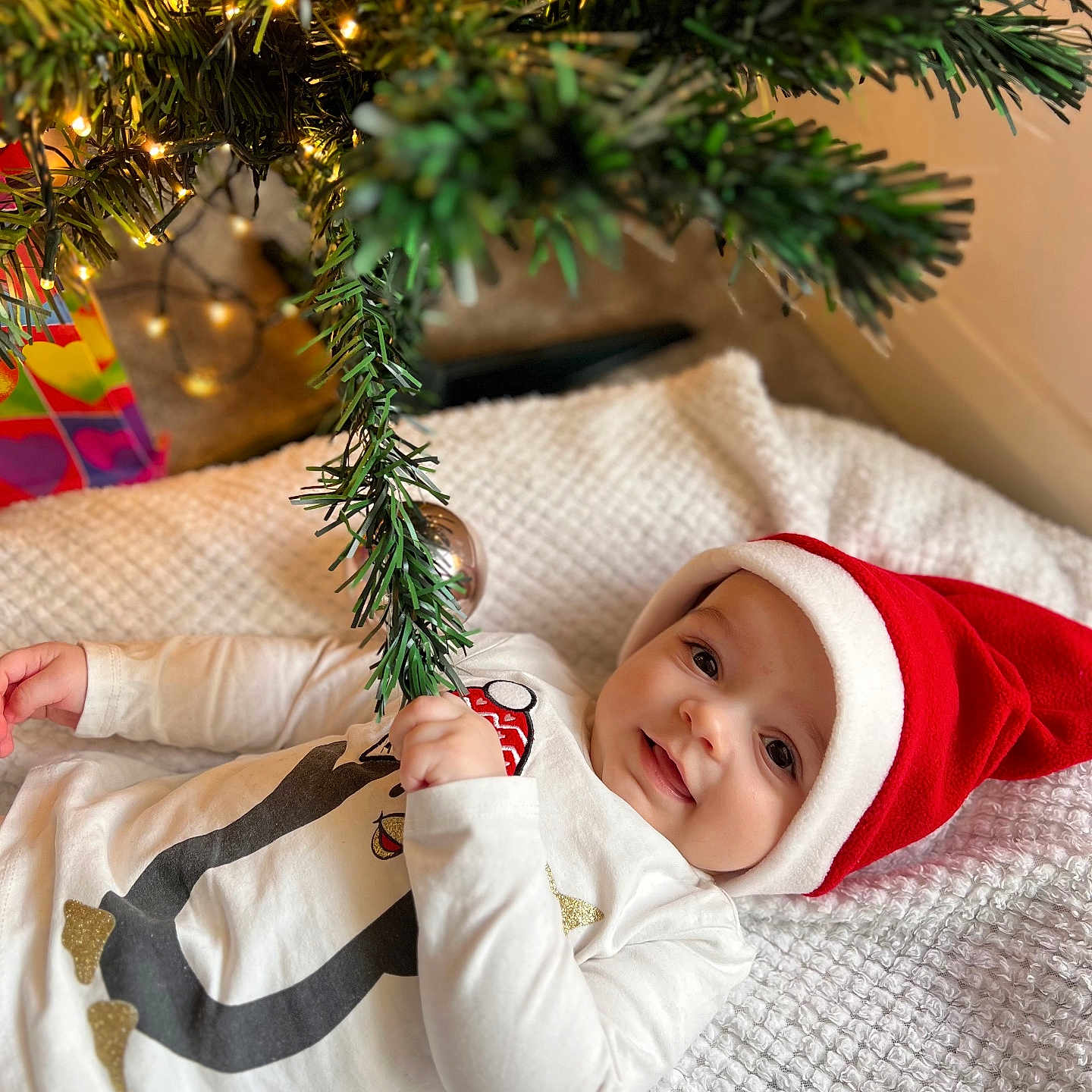 Damian joined the competition — help win amazing prizes! accessories, baby, blanket, cap, christmas, christmasdecorations, clothing, face, festival, happy, hat, head, hood, newborn, person, photography, plant, portrait, smile, tree