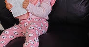 Zoei joined the competition — help win amazing prizes! baby, child, infant, smiling, portrait, pink_outfit, floral_clothing, headband, sitting, leather_chair, paper, holding_paper, indoor, close_up, happy, face, earrings, socks, fashion, family_photo
