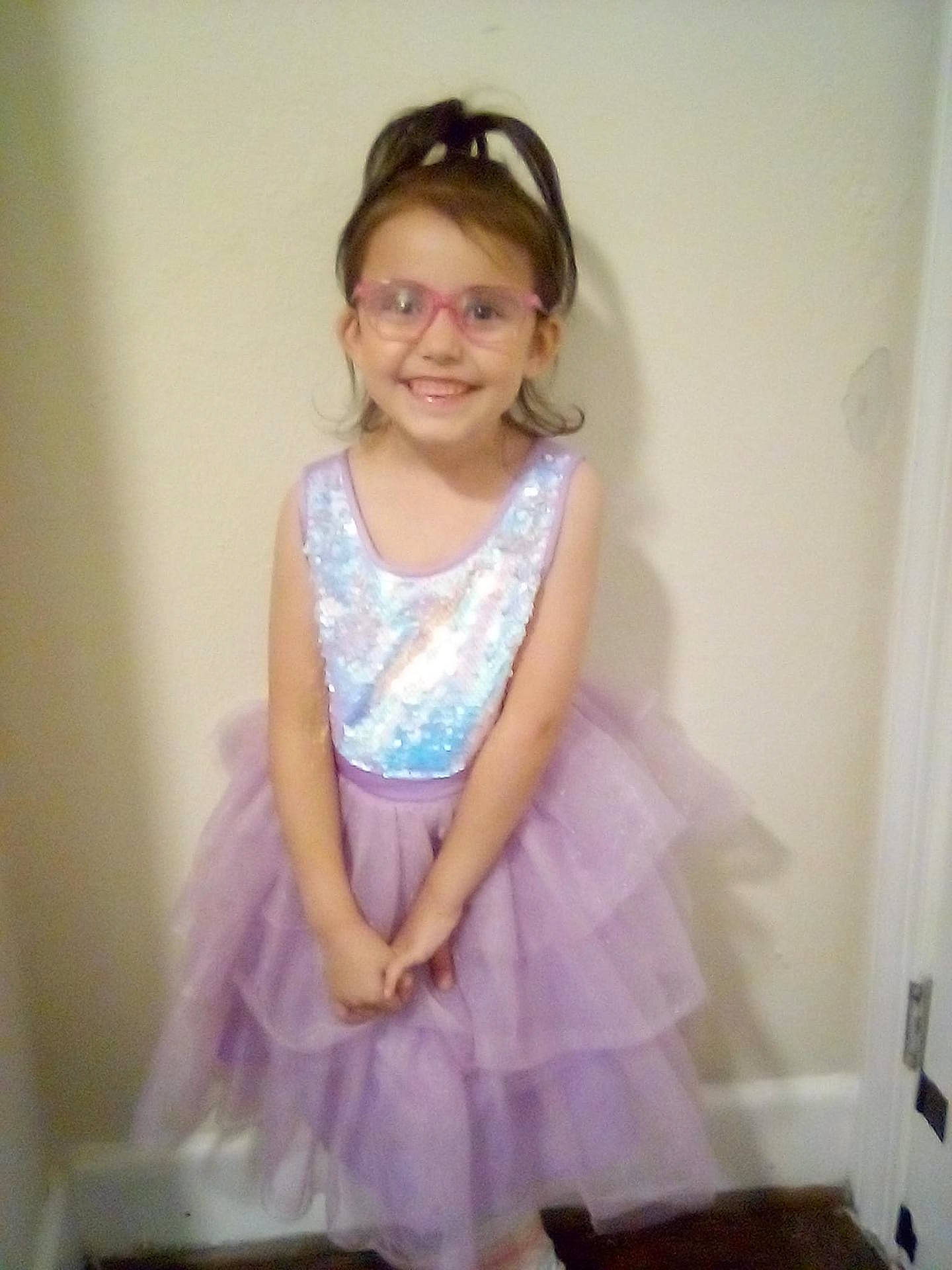 Everli Rose is registered to the contest to win money with this photo: accessories, child, clothing, costume, dress, eveningdress, face, fashion, female, formalwear, girl, glasses, head, jewelry, necklace, person, photography, portrait, purple, skirt