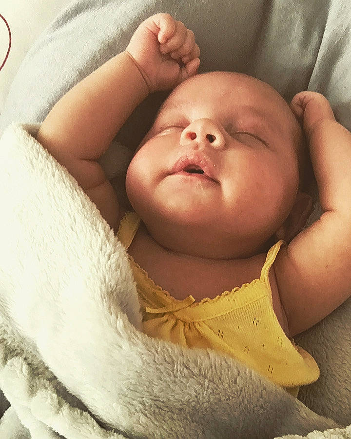 Orianna is registered to the contest to win money with this photo: baby, baby_sleeping, bedtime, cheek, child, chin, ear, eye, face, hand, head, lip, mouth, nose, person, skin, sleep, smile, toddler