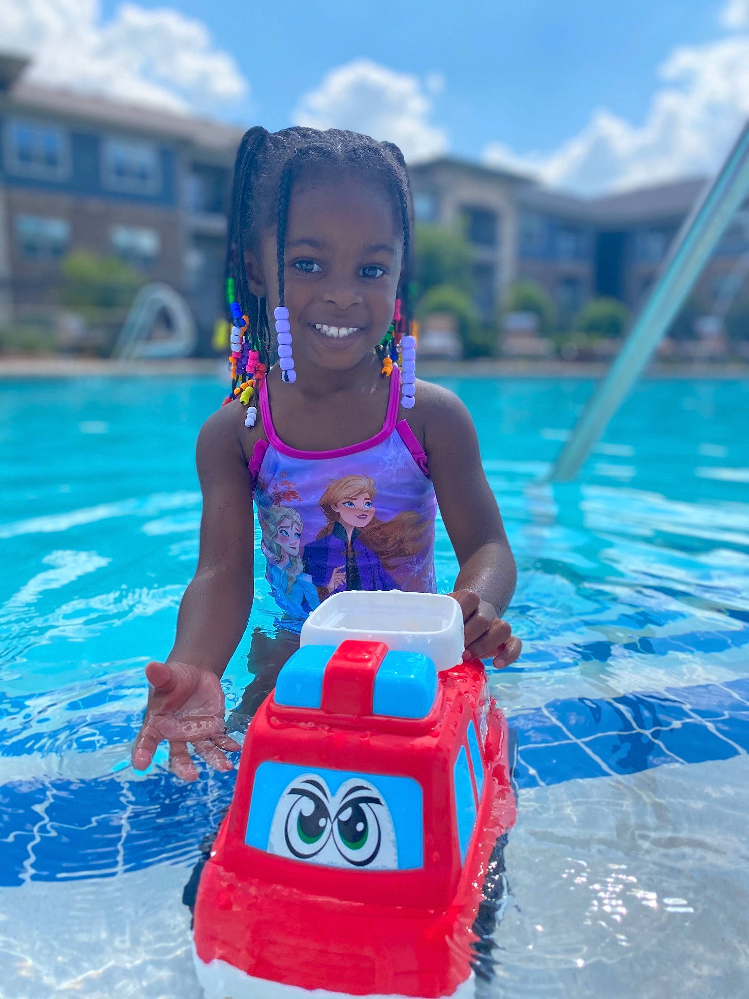 Taylor is registered to the contest to win money with this photo: baby_float, baby_products, child, fun, games, joy, leisure, lifejacket, person, personal_protective_equipment, play, product, recreation, smile, summer, swimming_pool, toddler, vacation, water, water_park