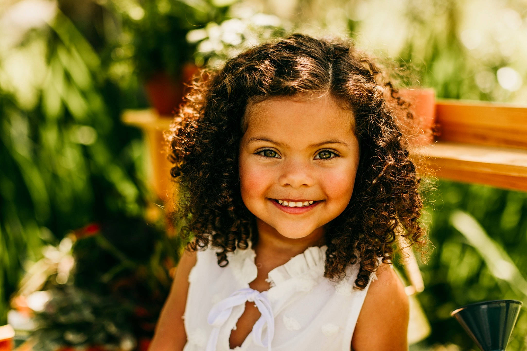 Everleigh joined the competition — help win amazing prizes! adaptation, beauty, black_hair, child, face, facial_expression, flash_photography, fun, grass, hair, hairstyle, happy, iris, joy, leisure, people_in_nature, person, plant, ringlet, smile