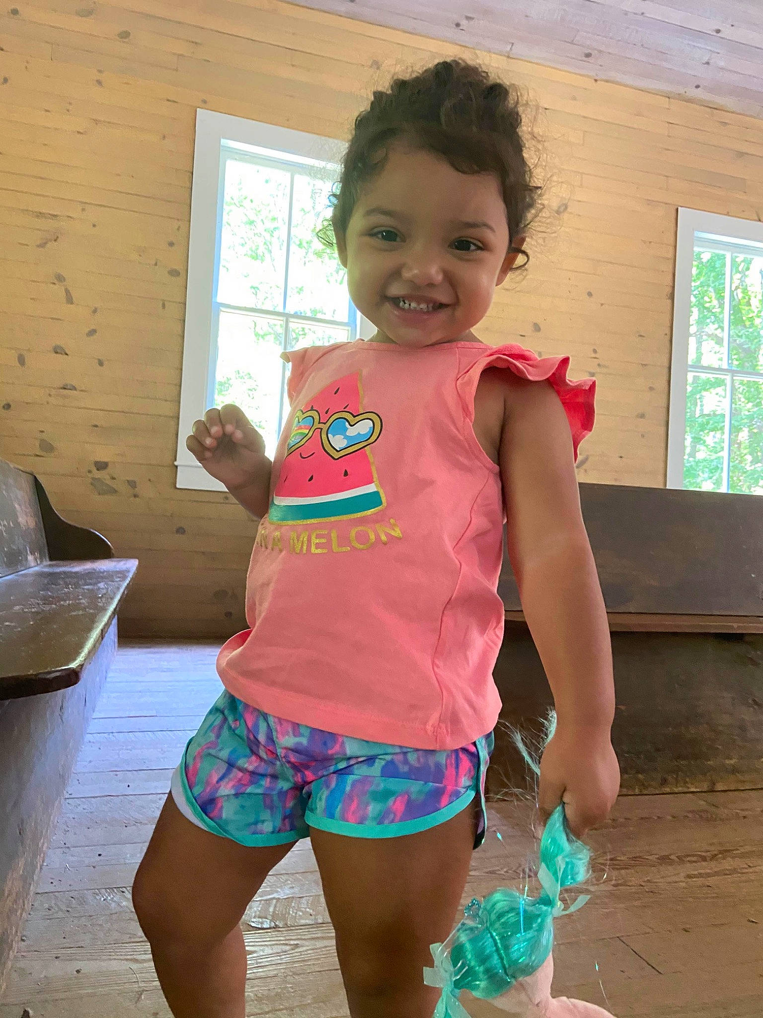 Aubreigh is registered to the contest to win money with this photo: abdomen, child, fun, hair, happy, human_leg, joy, leisure, neck, person, pink, shoulder, skin, sleeve, smile, standing, t_shirt, thigh, toddler, trunk