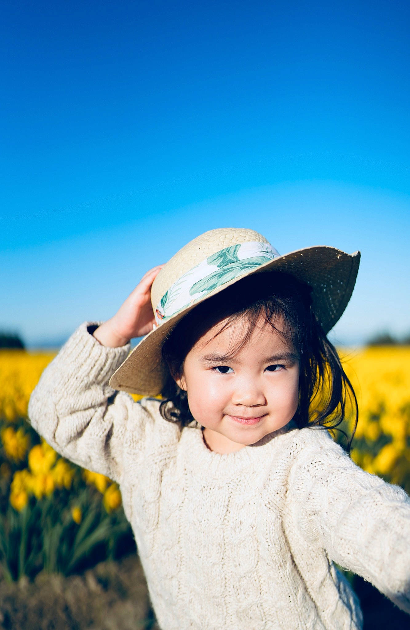 Annette joined the competition — help win amazing prizes! cap, eye, flash_photography, fun, grass, grassland, happy, hat, headgear, joy, landscape, people_in_nature, person, plant, skin, sky, smile, sun_hat, sunlight, toddler