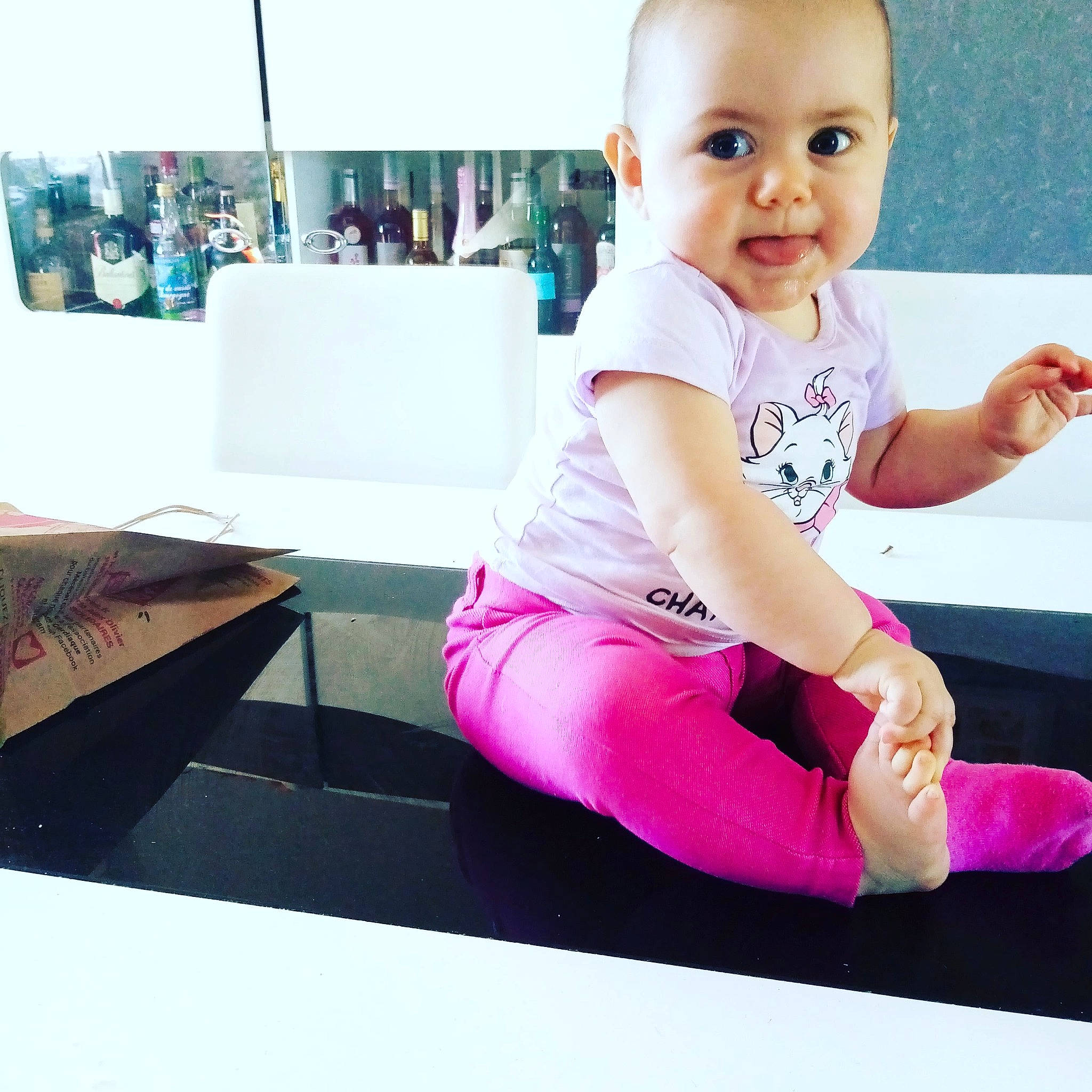Elena participe au concours pour gagner de l'argent avec cette photo : arm, baby, child, footwear, happy, joint, knee, leg, mat, person, physical_fitness, pink, play, shoe, shoulder, sitting, sportswear, toddler, yoga, yoga_mat