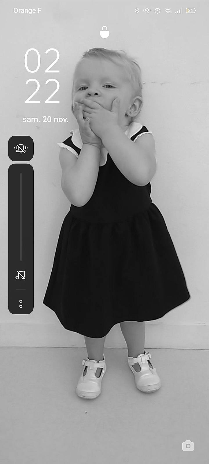 Isyanna participe au concours pour gagner de l'argent avec cette photo : arm, baby_toddler_clothing, black, dress, facial_expression, finger, gesture, hair, hairstyle, hand, happy, joint, leg, one_piece_garment, person, photograph, shoulder, sleeve, standing, style