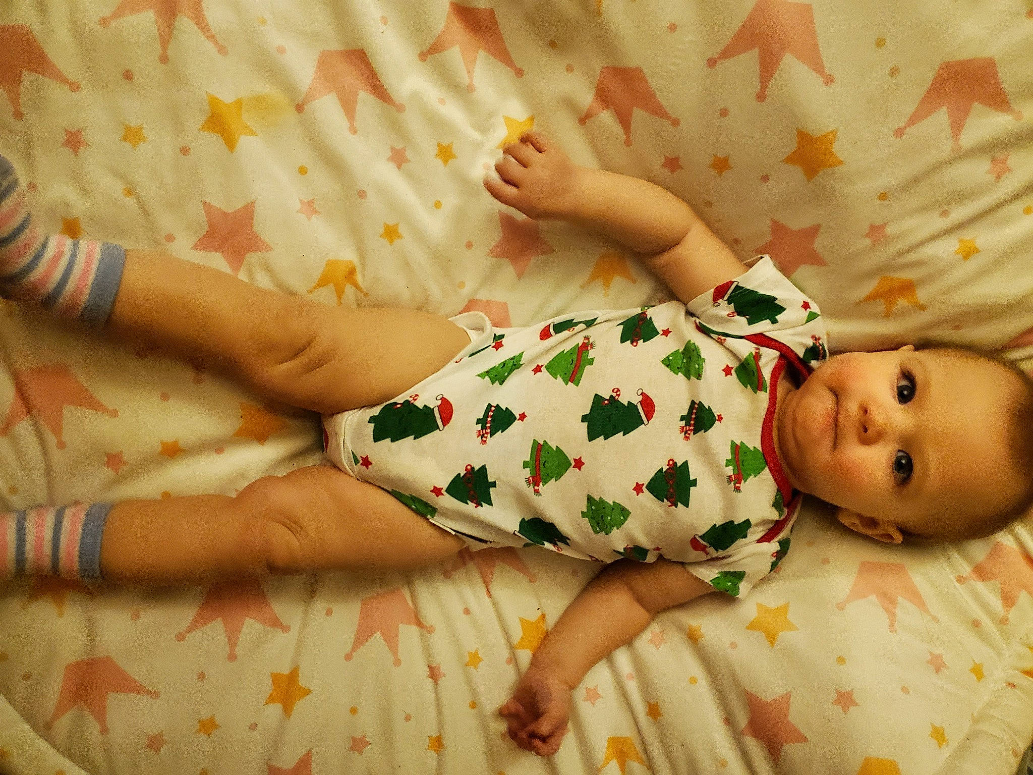 Ember joined the competition — help win amazing prizes! arm, baby, baby_sleeping, baby_toddler_clothing, bed, bedding, child, comfort, finger, hand, happy, human_body, human_leg, leg, linens, pattern, person, skin, sleeve, textile