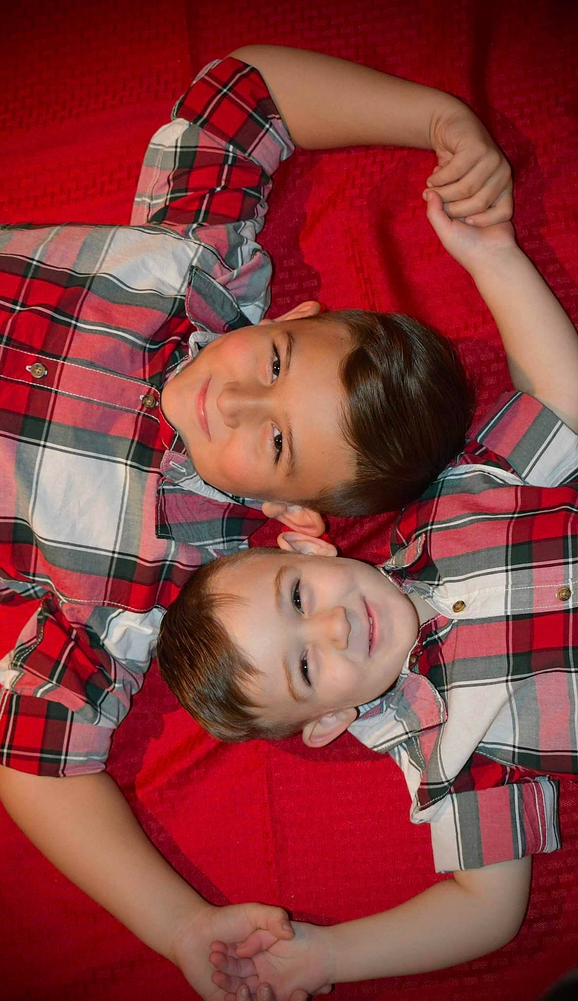 Caden joined the competition — help win amazing prizes! beauty, child, comfort, design, fun, gesture, happy, joy, lap, mammal, pattern, person, plaid, red, sleeve, smile, tartan, textile, thigh