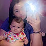 Scarlet joined the competition — help win amazing prizes! baby, woman, selfie, mirror, flash, colorful_clothing, heart_pattern, bracelet, purple_lighting, indoor, phone, reflection, holding, child, casual, portrait, cute, smiling, face, skin
