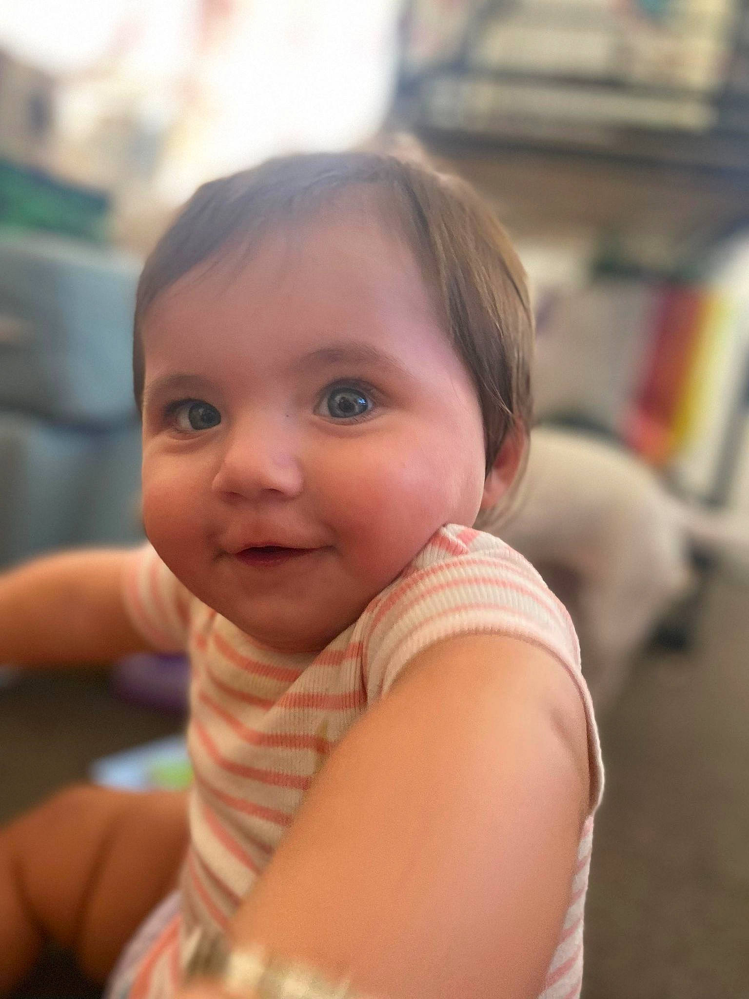 Layla is registered to the contest to win money with this photo: arm, baby_toddler_clothing, cheek, chin, eye, eyebrow, eyelash, face, flash_photography, forehead, gesture, happy, human_body, iris, joy, lip, neck, nose, person, skin