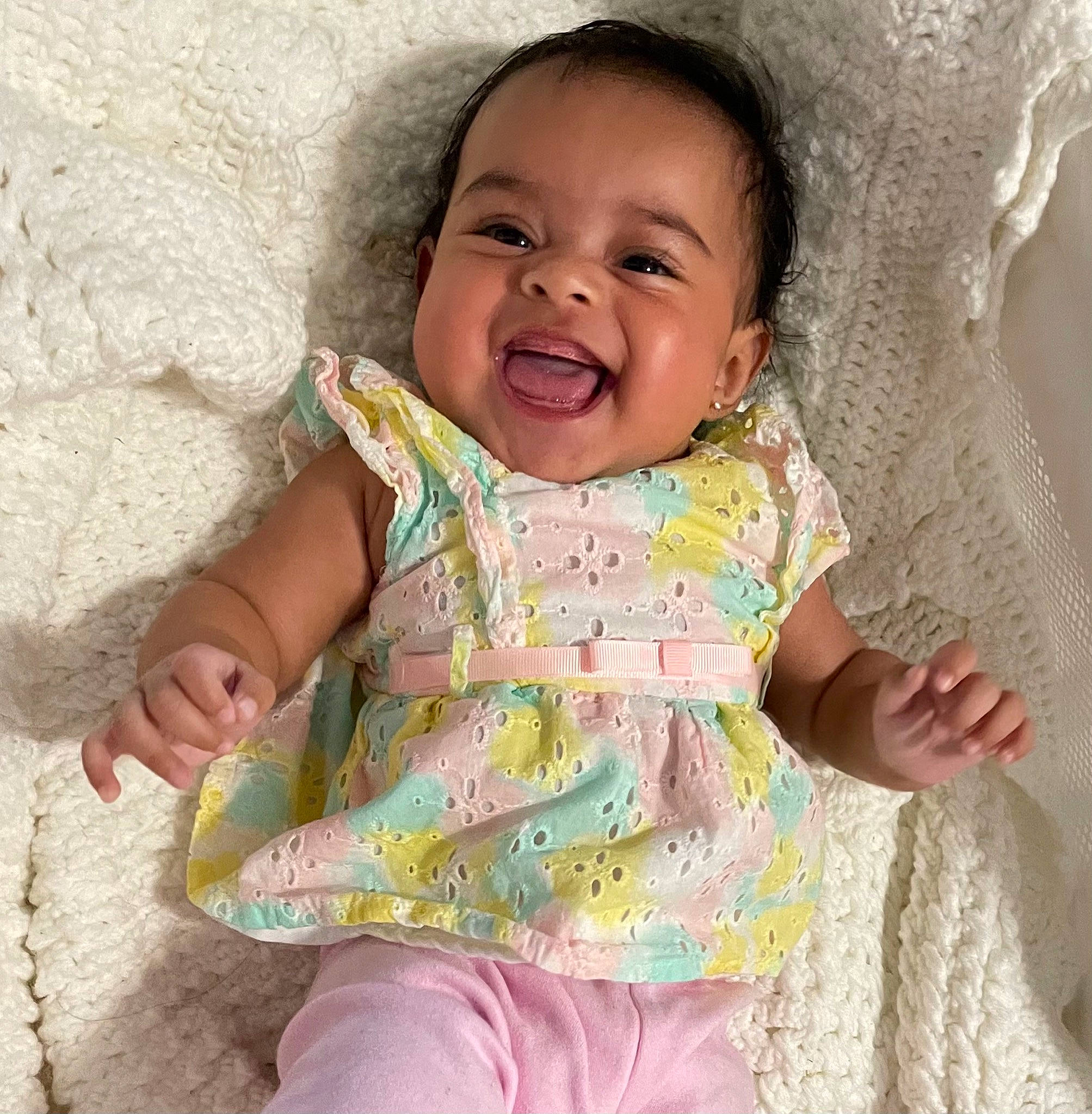 Jolene is registered to the contest to win money with this photo: arm, baby_toddler_clothing, cheek, eye, face, hair, hand, happy, human_body, iris, lip, neck, nose, organ, outerwear, person, product, skin, sleeve, smile