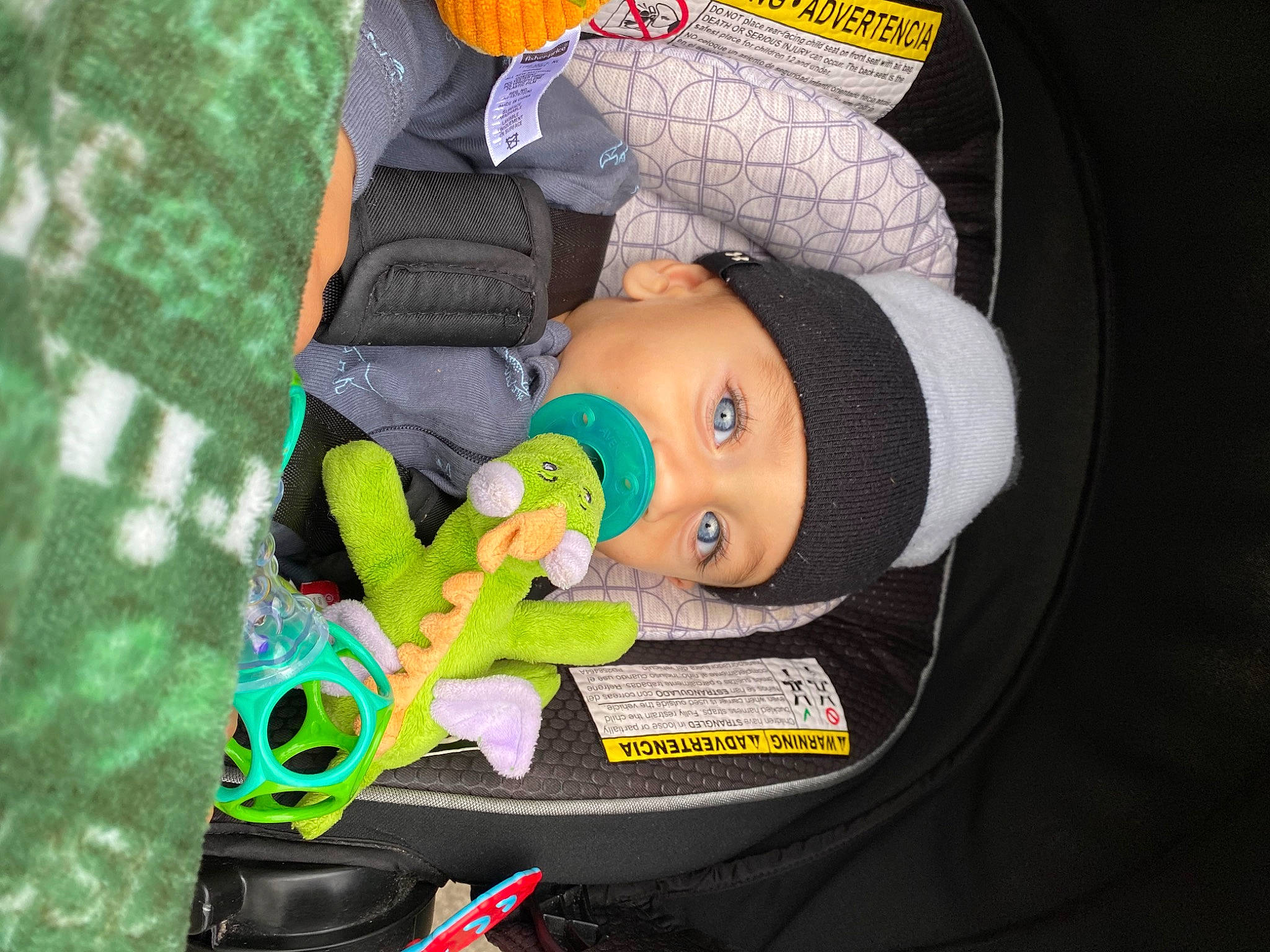 Leighton is registered to the contest to win money with this photo: baby, baby_carriage, baby_products, baby_safety, baby_toddler_clothing, car_seat, child, comfort, hat, headwear, lap, person, personal_protective_equipment, toddler