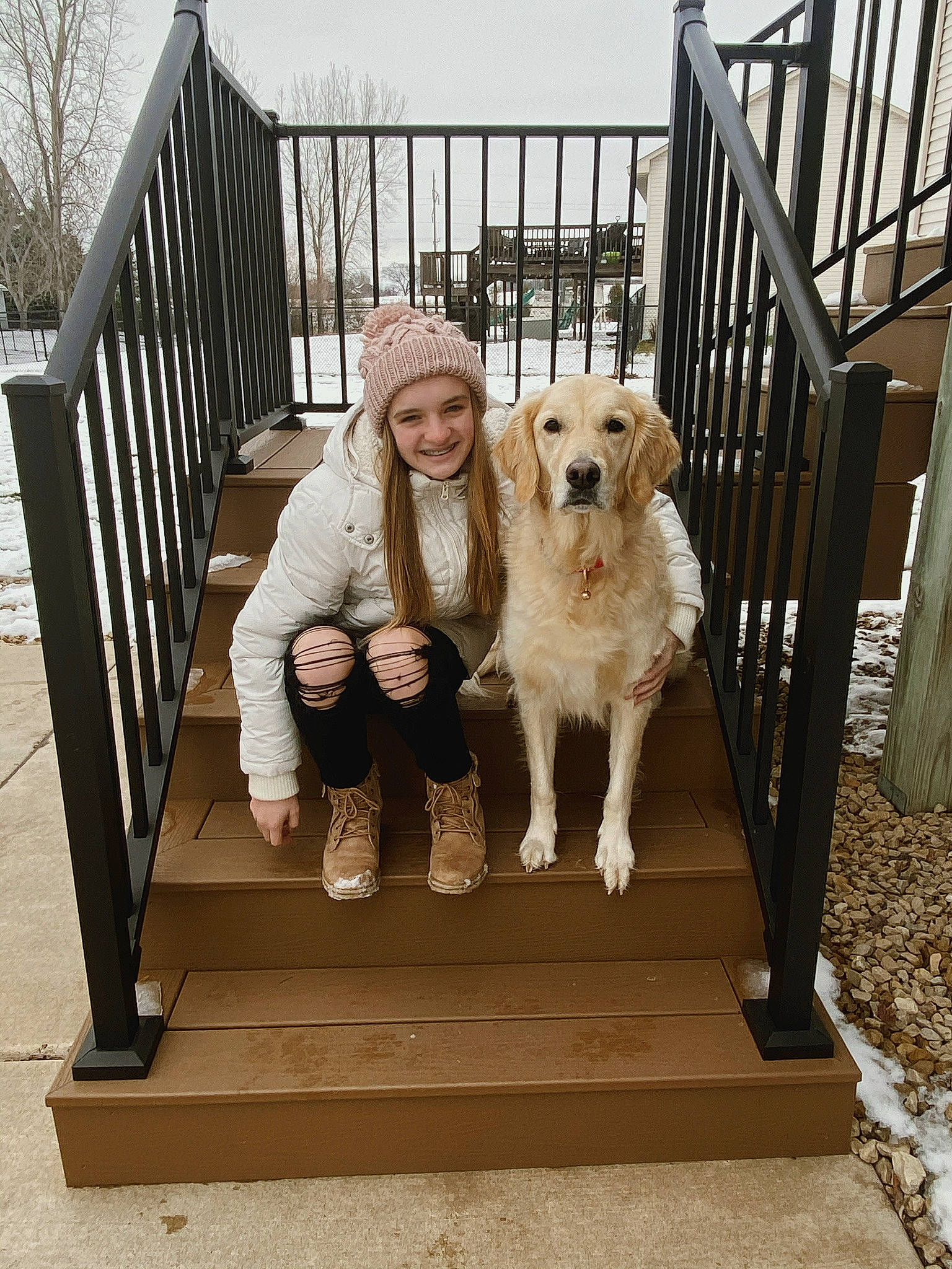 Jersey is registered to the contest to win money with this photo: beige, boot, canidae, carnivore, companion_dog, dog, dog_breed, fence, fur, handrail, human, iron, jacket, love, mammal, sporting_group, stairs, vertebrate, working_animal, working_dog