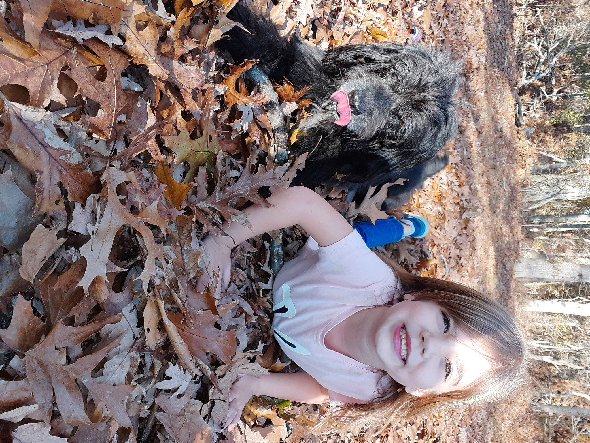 Chewy joined the competition — help win amazing prizes! branch, deciduous, fawn, forest, fun, fur, grass, hat, headgear, outerwear, pattern, people_in_nature, plant, smile, soil, tree, trunk, twig, winter, wood