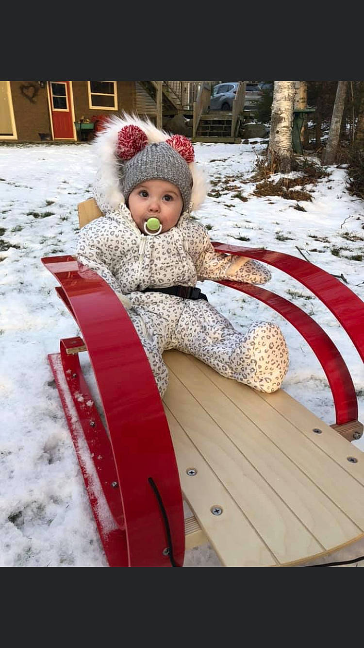 Hayleigh joined the competition — help win amazing prizes! child, fun, headwear, person, play, playing_in_the_snow, recreation, sled, snow, surprise, toddler, vehicle, winter
