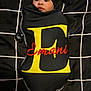 Emani joined the competition — help win amazing prizes! baby, bed, black, blanket, child, comfortable, cute, face, grid, hat, infant, lying_down, newborn, pacifier, pattern, person, red, sleepwear, swaddle, yellow