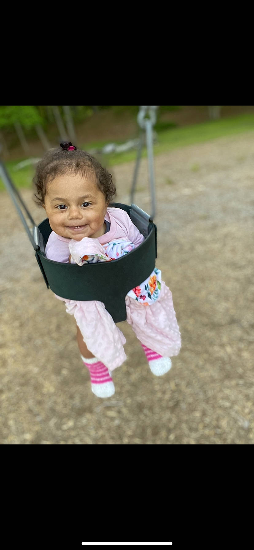 Kimora-jo is registered to the contest to win money with this photo: baby, baby_toddler_clothing, child, city, fun, grass, happy, joy, leisure, outdoor_play_equipment, people_in_nature, person, play, playground, portrait_photography, recreation, sitting, sleeve, smile, swing