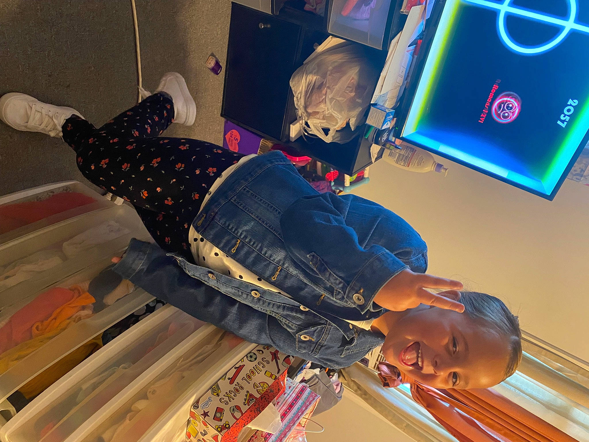 Gracie-ann joined the competition — help win amazing prizes! display_device, elbow, electric_blue, entertainment, event, fun, human_leg, knee, leisure, machine, person, recreation, space, thigh, wood