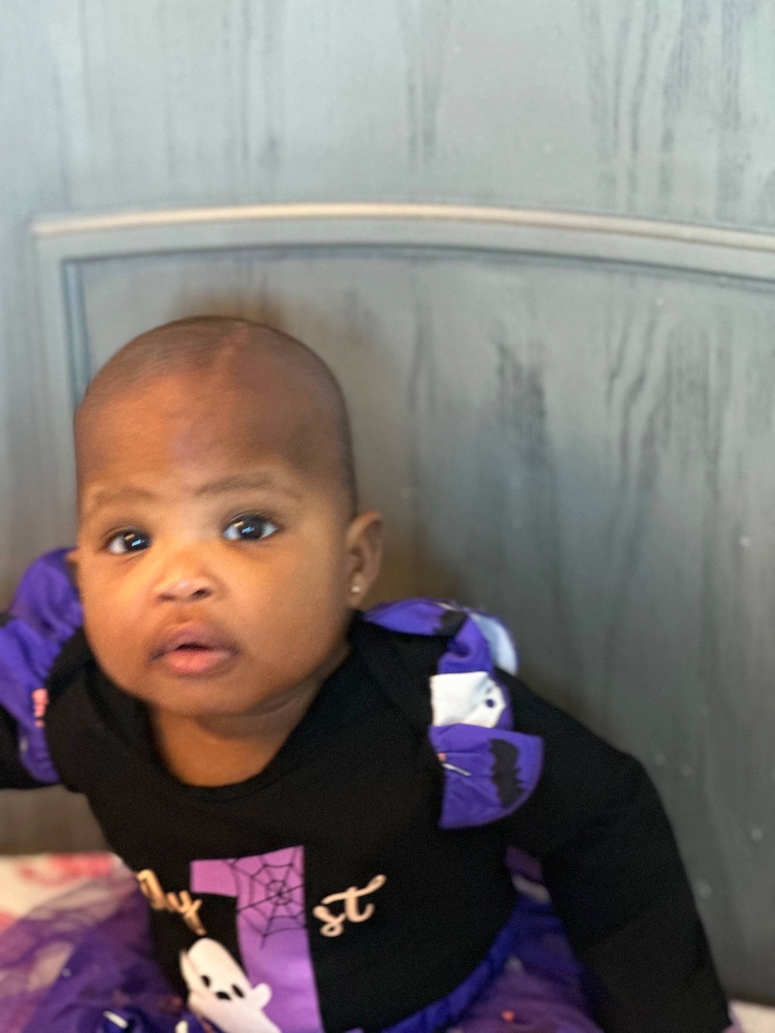 Lenora is registered to the contest to win money with this photo: baby, baby_toddler_clothing, cheek, child, chin, ear, eyelash, fun, happy, iris, lip, magenta, nose, person, purple, sitting, smile, t_shirt, toddler