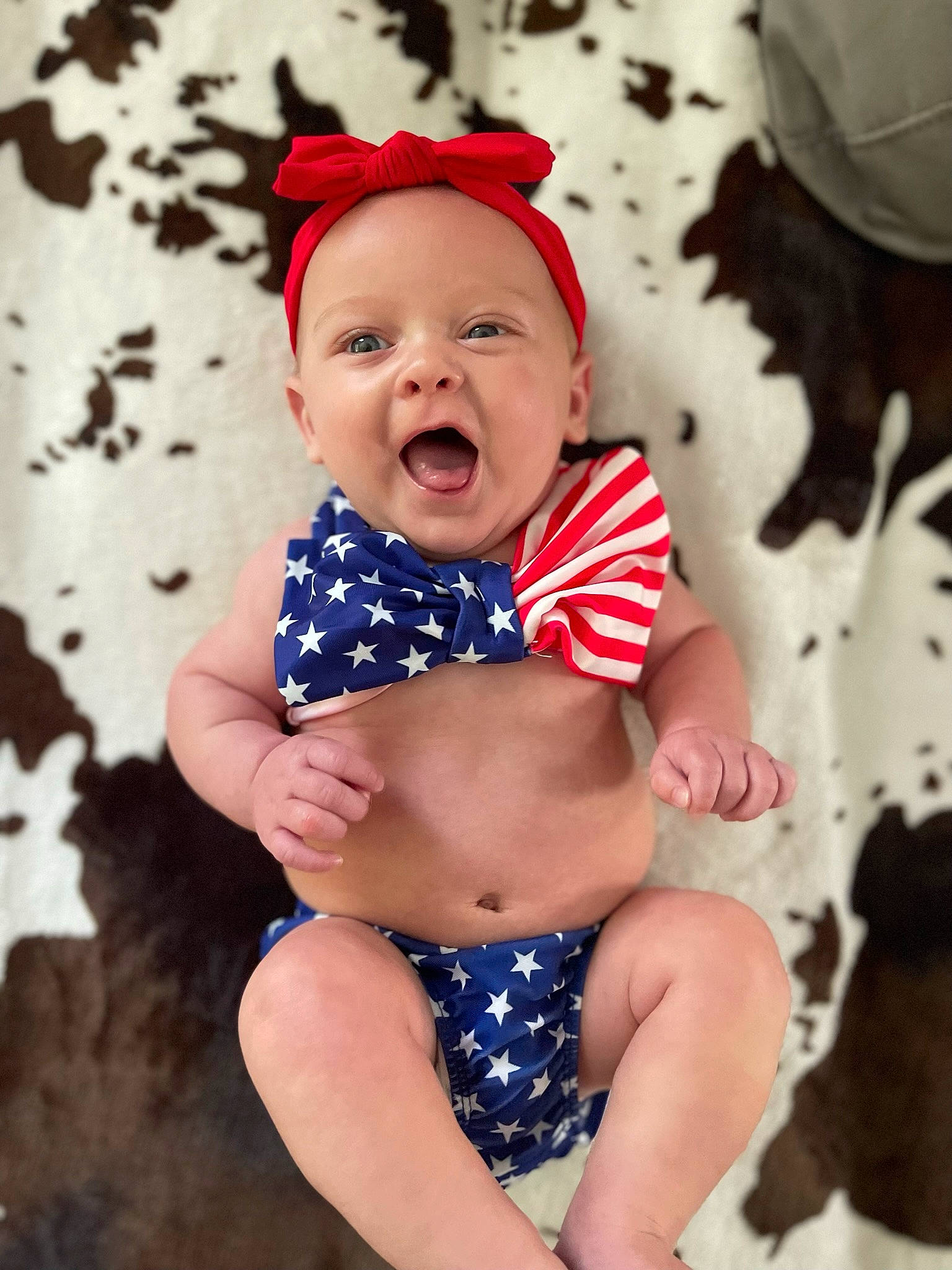 Rowan joined the competition — help win amazing prizes! abdomen, baby, baby_toddler_clothing, chest, eye, face, happy, hat, head, headwear, human_body, human_leg, knee, leg, person, skin, sleeve, smile, stomach, thigh
