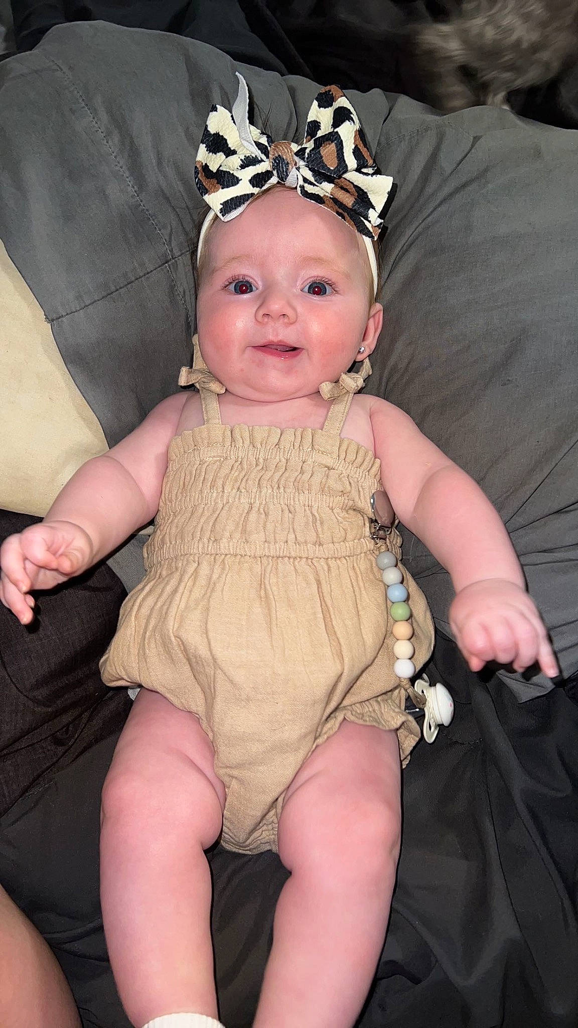 Bexley is registered to the contest to win money with this photo: baby, baby_toddler_clothing, costume_hat, embellishment, eye, eyelash, fawn, finger, flash_photography, happy, head, headband, headpiece, headwear, iris, jewellery, person, pink, skin, smile