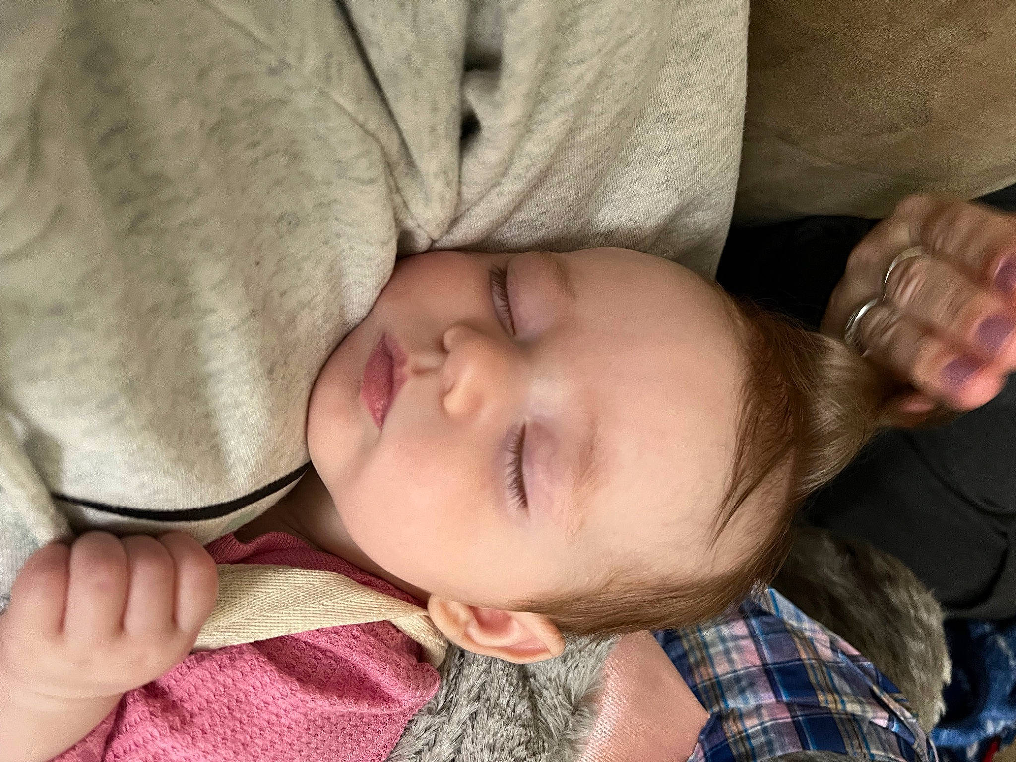 Bexley is registered to the contest to win money with this photo: baby, baby_toddler_clothing, cheek, child, comfort, ear, eyelash, finger, gesture, hand, happy, iris, mouth, nose, person, plaid, skin, tartan, thumb, toddler