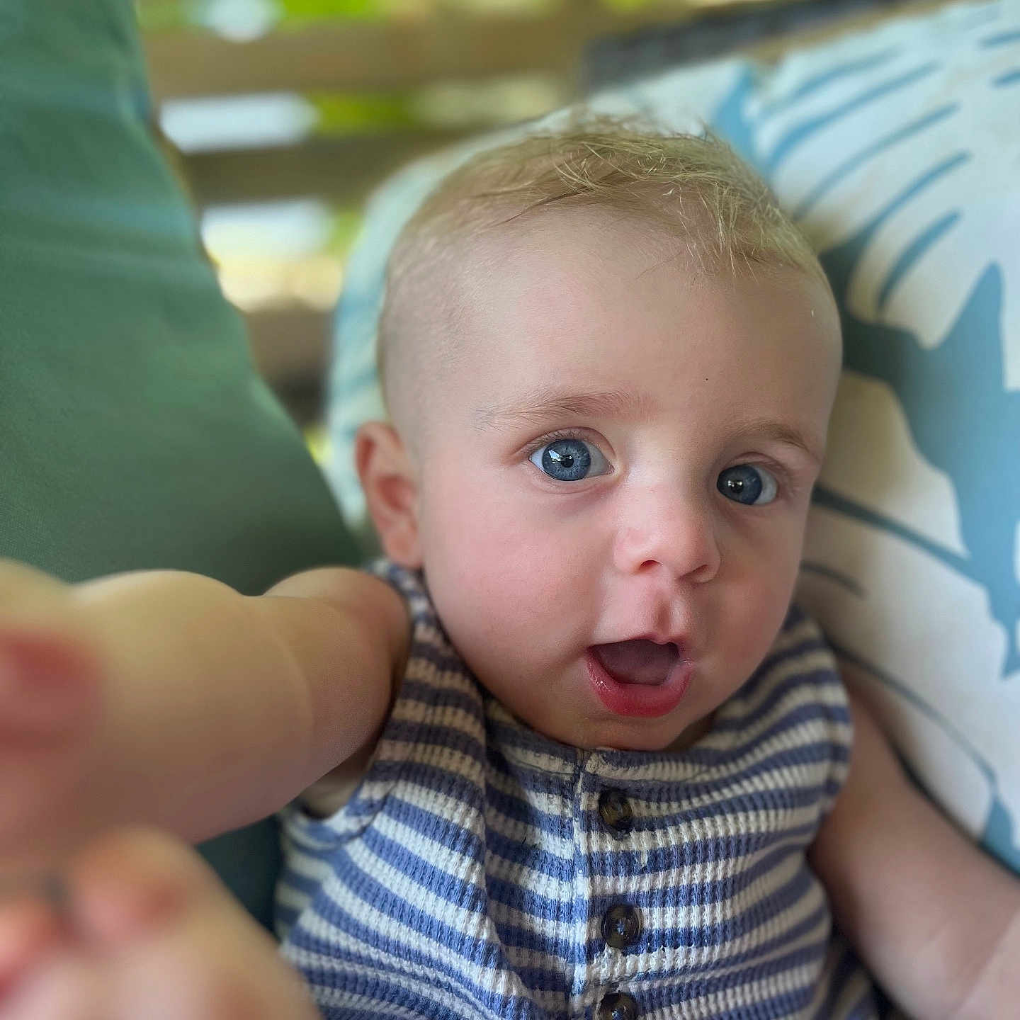 Finnegan is registered to the contest to win money with this photo: accessories, baby, bodypart, clothing, couch, cushion, face, finger, furniture, hand, head, homedecor, mouth, newborn, pants, person, photography, portrait, selfie, t_shirt