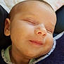baby, child, face, sleeping, smile, infant, closeup, skin, head, clothing, neck, portrait, peaceful, cute, young, person, rest, cozy, expression, relaxation