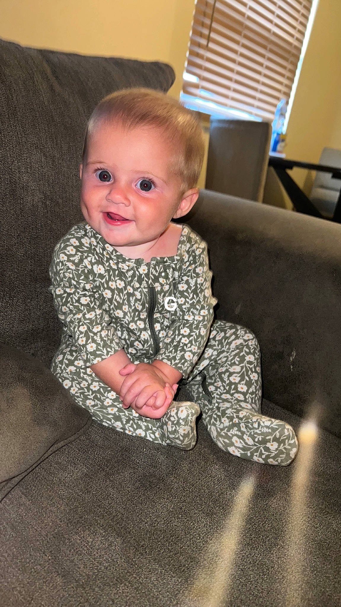 Lakelynn is registered to the contest to win money with this photo: baby, baby_toddler_clothing, carpet, cheek, child, comfort, couch, floor, flooring, fun, joy, pattern, person, room, sitting, skin, sleeve, smile, t_shirt, toddler