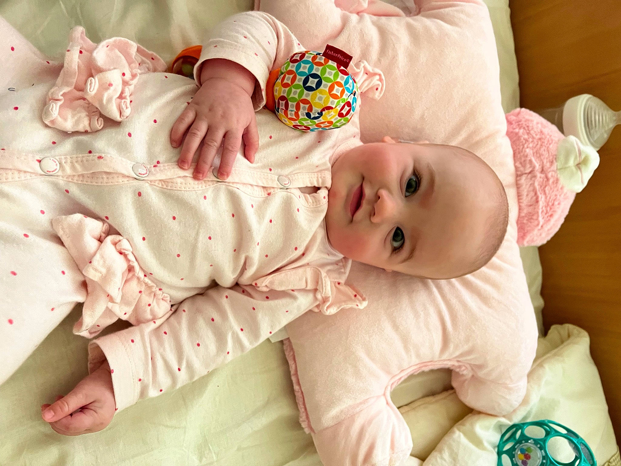 Kaia joined the competition — help win amazing prizes! baby, baby_sleeping, baby_toddler_clothing, cheek, child, comfort, eye, face, facial_expression, green, head, linens, people, person, pink, skin, sleeve, smile, textile, toddler