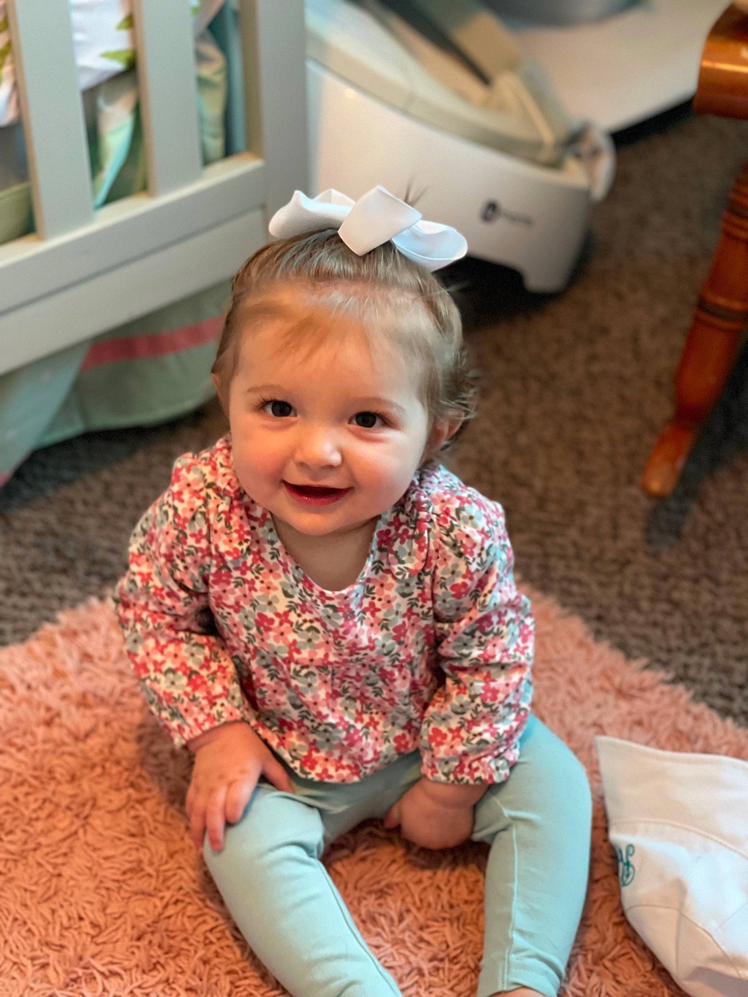 Remi joined the competition — help win amazing prizes! baby, baby_toddler_clothing, cheek, child, eye, face, flooring, fun, hairstyle, happy, head, joy, leisure, people, person, sitting, skin, sleeve, smile, tire