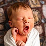 Melissa is registered to the contest to win money with this photo: baby, newborn, yawning, sleepy, wrapped, blanket, infant, cute, portrait, face, hand, closeup, soft, peaceful, child, indoors, human, skin, expression, resting